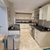 Photo 2: Kitchen with range cooker