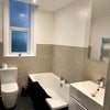 Photo 6: Bathroom with shower and bath