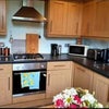 Photo 5: The kitchen but the other way