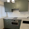 Photo 2: Good size kitchen in trendy Sage colour