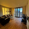 Photo 4: The flat is modern, clean, and well maintained, with all essential furniture included
