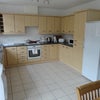 Photo 7: Large eat in kitchen