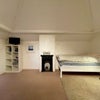 Photo 9: The attic room / private office & living room option on 3rd floor (bed can be moved out).
