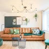 Photo 7: Living area with sofa's for movie nights