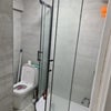 Photo 3: Shower and toilet 