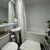 Photo 7: Large shared bathroom