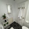 Photo 8: Shared bathroom with ample storage
