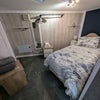 Photo 9: Hanging space mirror and drawers in bedroom