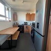 Photo 6: Kitchen view from room with door opened