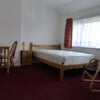 Photo 5: Large bedroom overlooking garden (4.3m x 3.5)