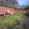 Photo 8: The back garden is perfect for barbecuing