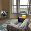 Photo 4: Sitting area with TV
