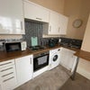 Photo 5: Fully equipped kitchen area