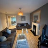 Photo 3: Large sitting room with 2 huge sofas