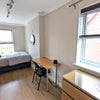 Photo 2: Double bed & desk