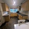 Photo 2: Modern, fully equipped kitchen with gas hob, washing machine and plenty of storage