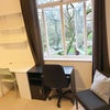 Photo 1: 2 desks, 3 chairs and window view overlooking St Martins Gardens