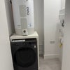 Photo 9: Utility Room with LG Washer Dryer
