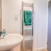 Photo 5: shared shower room, cleaned weekly