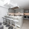 Photo 3: Kitchen including utility area