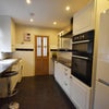 Photo 2: Lovely Kitchen with double oven and breakfast bar
