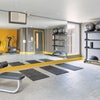Photo 7: Fully-equipped fitness room, included in your rent