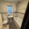 Photo 5: Bathroom with bath snd shower 