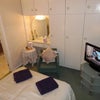 Photo 1: The Double bedroom en-suite Room 2, is furnished with a double bed with linen and bedding included, 