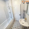 Photo 9: Shared Bathrooma
