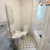 Photo 10: Shared Bathroom b