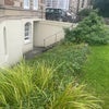 Photo 4: Front of property showing entrace.