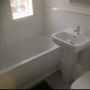 Photo 5: Bath with shower over