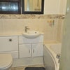 Photo 8: Family bathroom with bath and power shower