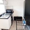 Photo 2: Kitchenette & desk