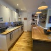 Photo 3: Fully integrated kitchen with a washing machine, dishwasher, fridge and freezer