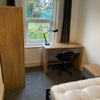 Photo 2: Room 5 - Desk with chair overlooking the garden