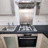 Photo 4: Oven, hob, extractor, sink
