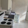 Photo 5: cooker and fridge