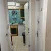 Photo 6: a corridor leading to the kitchen, rented room and bathroom