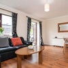 Photo 3: Living and dining area with garden views