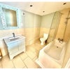 Photo 4: Shared bathroom