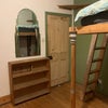 Photo 3: Available room bookshelf, mirror and door.