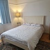 Photo 1: Comfortable bed