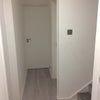 Photo 4: Corridor to room (right door)