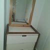 Photo 4: Drawer and a mirror, also a small fridge in the room for you comfort 