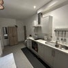 Photo 2: All appliances and crockery included