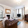 Photo 2: Beautiful large living room with panaromic views into West Hampstead