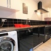 Photo 7: Fully Fitted Kitchen, with washing machine, Dishwasher, Large American Fridge / Freezer