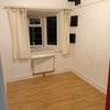 Photo 4: The available room when empty