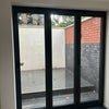 Photo 8: Bifold doors to downstairs terrace 
